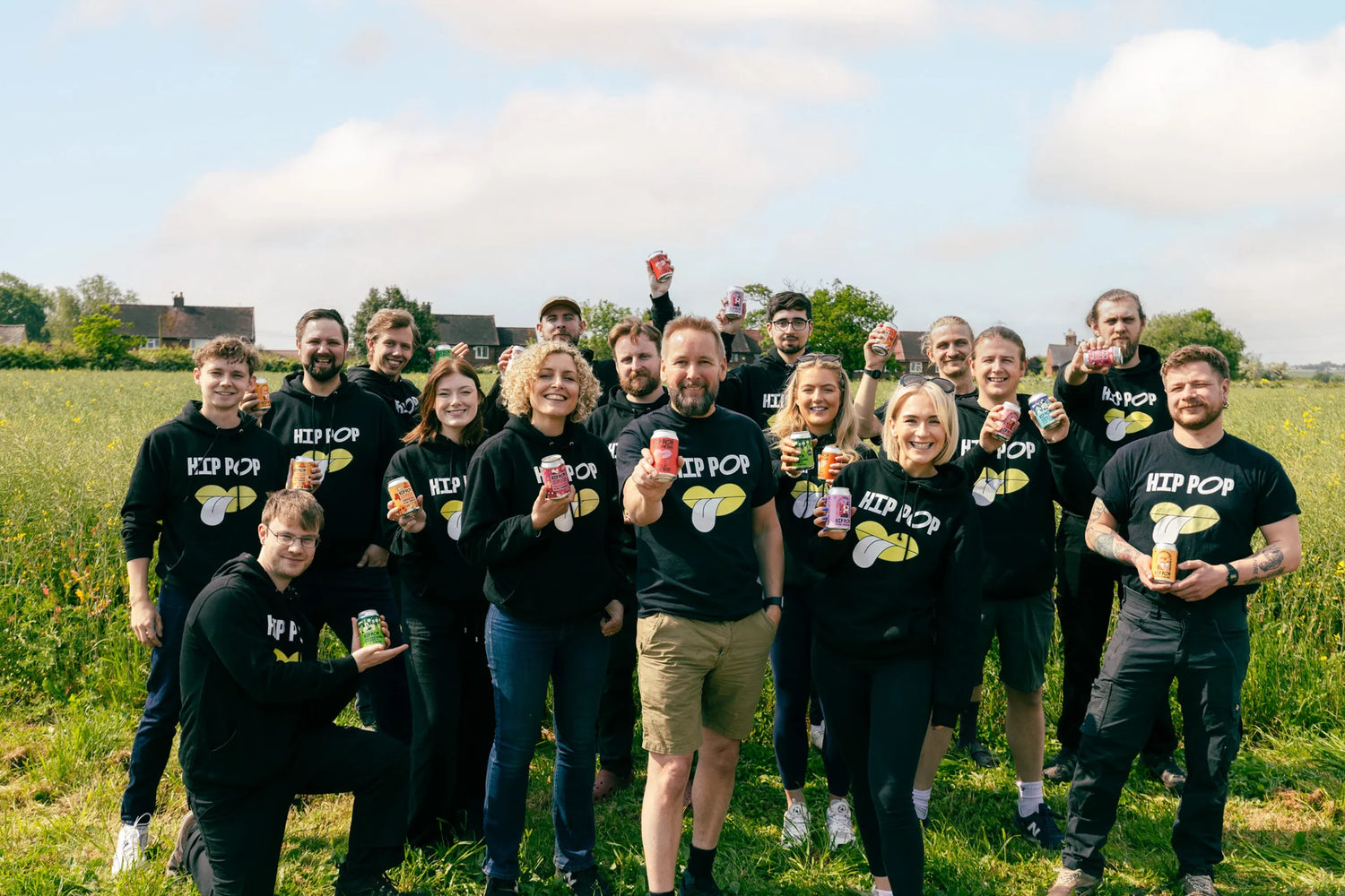 Hip Pop Kombucha founders with their employees group picture